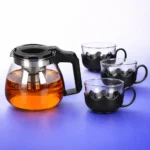 طقم براد شاي زجاجي 5 قطع مع شاي دافئ وأكواب ممتلئة