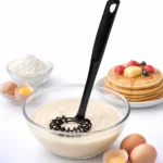 مضرب بيض يدوي سيليكون أسود بتصميم مسطح مبتكر