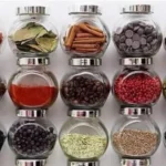 ترتيب طقم برطمان توابل زجاجي من الألومنيوم 4 قطع فوق بعضها لتوفير المساحة