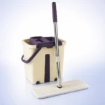 عرض متكامل لمكونات مساحة سمارت موب موديل توين (Twin) باللون البيج، تظهر الجردل المزدوج واليد المعدنية المتينة مع غيار الميكروفيبر لنظافة احترافية بالهاء.