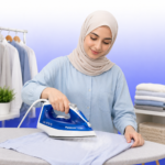 سيدة تستخدم مكواة بخار باناسونيك لكي القمصان بسهولة