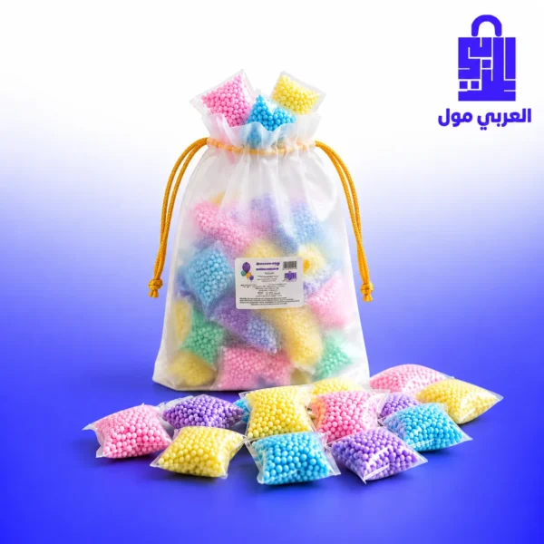 أكياس معطر ملابس على هيئة حبيبات ملونة موزعة داخل كيس أورجانزا فاخر بحبل سحب ومحاطة بفوط ناعمة